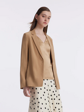 a lady in a brown mulberry silk double-layer blazer